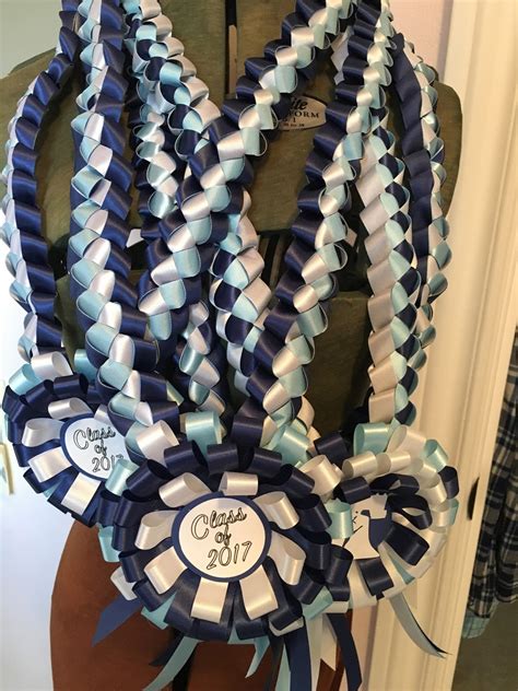 Graduation ribbon lei - The quality and attention to detail in this 2023 Graduation Ribbon Lei is exceptional. It not only captured the school colors perfectly but also provided a lovely volume and aesthetic appeal. The additional pin-on graduation year added a personal touch and made it even more memorable. Images in this review Helpful ...